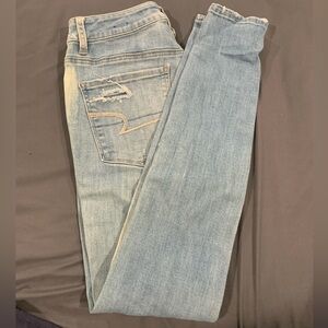 American Eagle Super Stretch size 4 ripped jeans